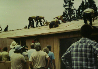a large group of people working on the One Day House for NIBCA